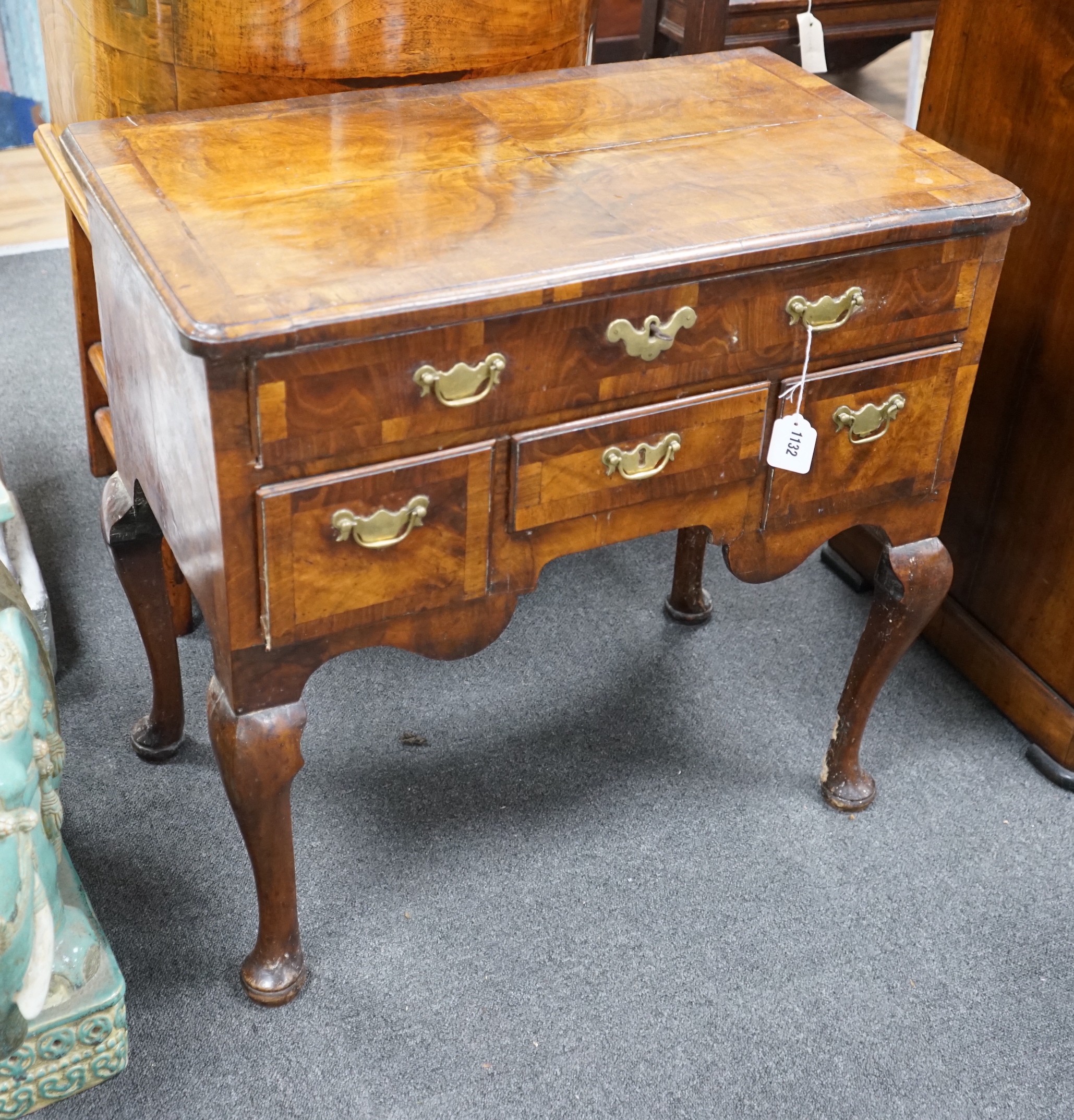 An early 18th century banded walnut lowboy width 74cm, depth 44cm, height 71cm